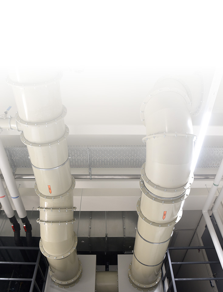 A large pipe system in a room.